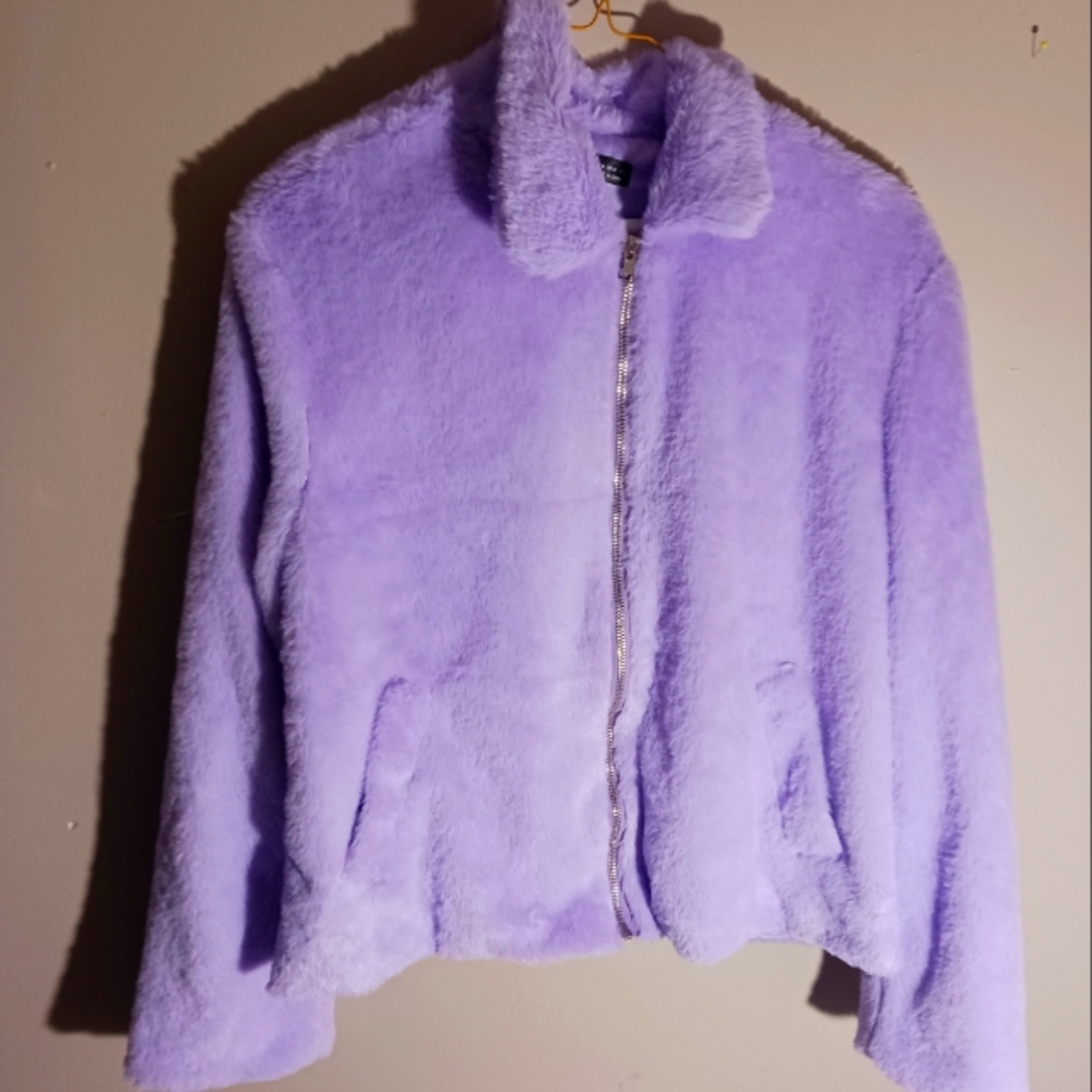 A light purple fuzzy jacket, size Medium. From Shein.